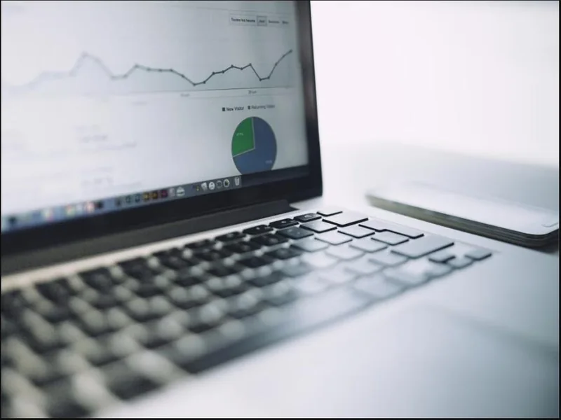 A laptop showing an automated analytics dashboard